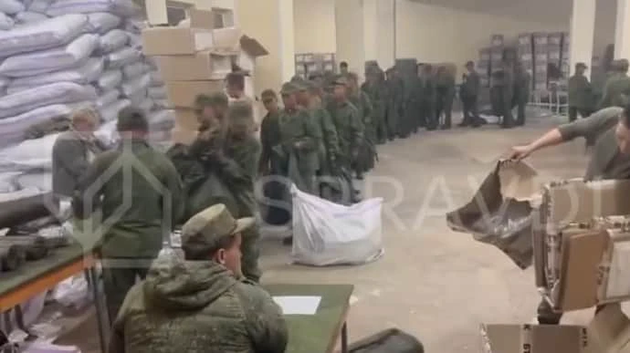 Ukrainian government posts video showing North Korean soldiers being given Russian equipment